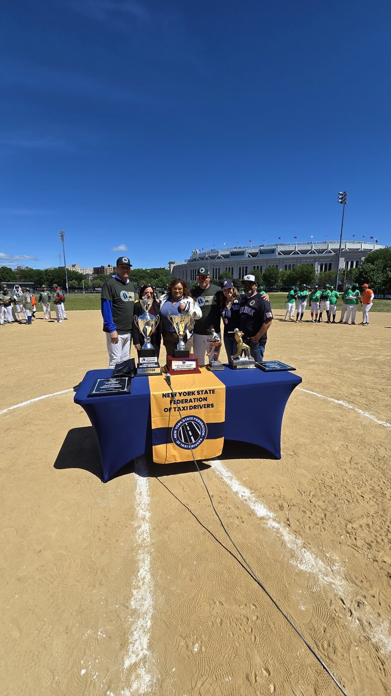 Awards table set up at home plate, Yankee Stadium in the distance