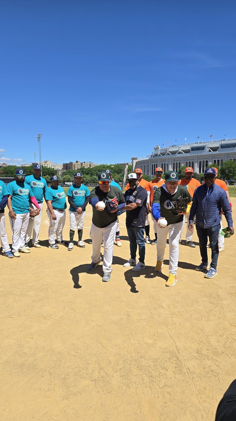 Ceremonial first pitch with Yankee Stadium in the background